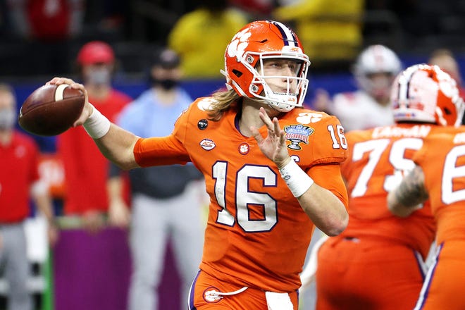 Trevor Lawrence (16) of the Clemson Tigers passes against the Ohio State Buckeyes in the second half during the College Football Playoff semifinal game at the Allstate Sugar Bowl at Mercedes-Benz Superdome on January 01, 2021 in New Orleans, Louisiana.