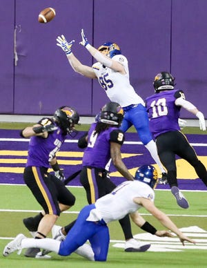 South Dakota State Jackrabbits tight end Tucker Kraft (85) reaches for a touchdown pass as it is knocked away by Northern Iowa Panthers defensive back Omar Brown (24) in the first quarter at a Northern Iowa Panthers football game with the South Dakota State Jackrabbits at the UNI-Dome in Cedar Falls on Friday, Feb. 19, 2021.  (Rebecca F. Miller/The Gazette)