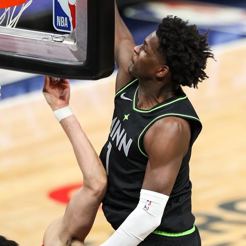 Edwards dunks on Toronto's Yuta Watanabe on Friday