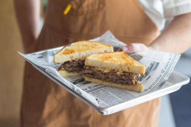 A patty melt at Dad's Favorite Burgers, a diner-inspired stand coming to the Delray Beach Market. SAMUEL THORNHILL/MAS APPETIT