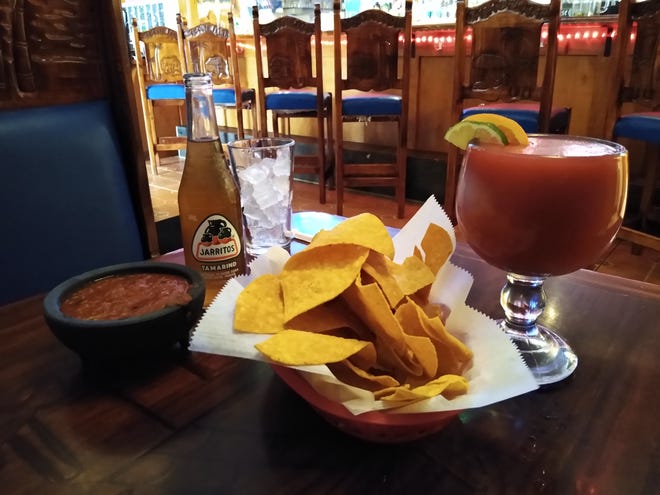 Complimentary chips and salsa are served with a raspberry margarita and a Jarritos Tamarind soft drink at Casa Del Mar restaurant in Norton.