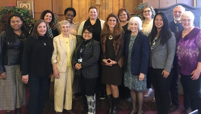 The 2020 Mercy Center winners who make history are shown: first row from left, Angela Euell McNair, Christine Hetz Phillips, Phyllis Schleicher, Zimmermann von Niken Astari, Mercy Center Executive Director, Jennie Hagerty, Lee Penman, Christine Lomiguen and Shirley Hamil Schell; and back row from left: Carmen Schattner, Lisa Heidelberg, Melanie Hetzel-Riggin, Melissa Gibson, Rachel Lusky and Gary Welker, who stand for the late Dixie Rose Welker. For 2021, the center will highlight previous recipients in March, the month of women's history.