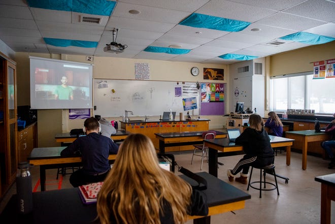 Students watch a video about careers in engineering on Tuesday, Feb. 23, 2021 at Lakeview Middle School in Battle Creek, Mich.