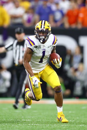LSU receiver Ja'Marr Chase runs with the ball against Clemson in the College Football Playoff national championship game Jan. 13, 2020 in New Orleans, Louisiana.