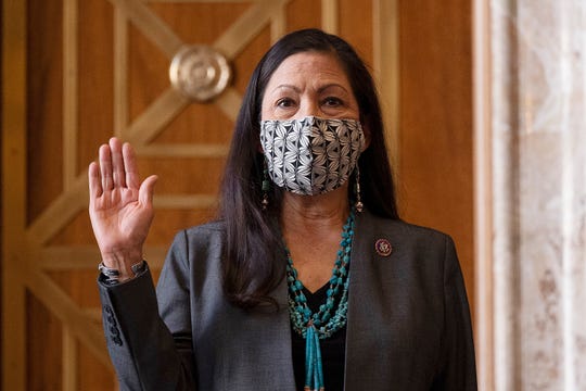 Rep. Deb Haaland, D-N.M., is sworn in before the Senate Committee on Energy and Natural Resources hearing on her nomination to be Interior secretary on Feb. 23, 2021, on Capitol Hill in Washington.