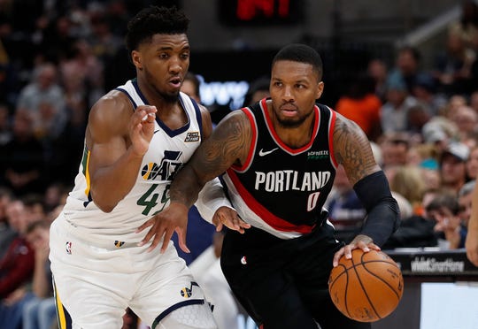 Damian Lillard (0) and Donovan Mitchell (45) are likely shoo-ins to make the All-Star team as reserves.