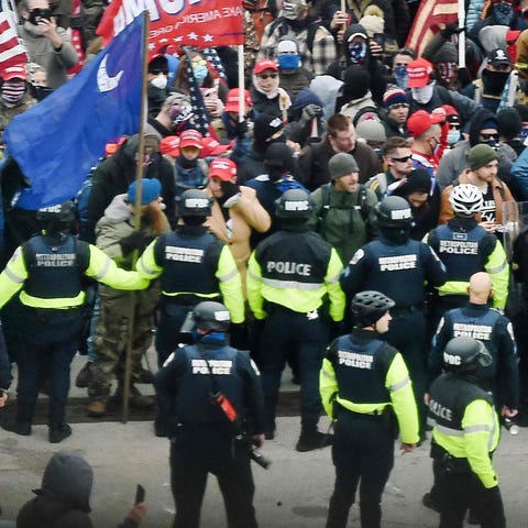 Trump supporters clash with police and security fo