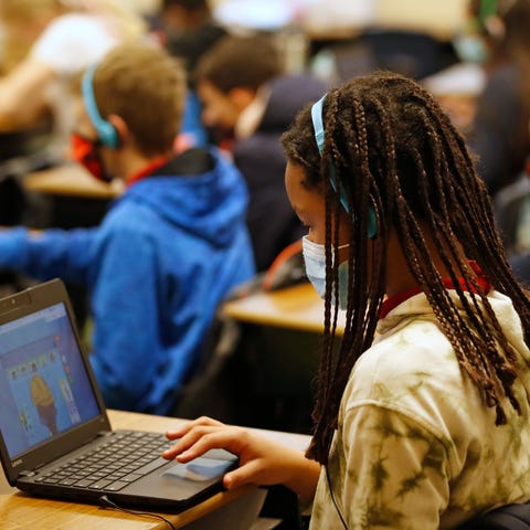 A student works on a computer at Freedom Preparato