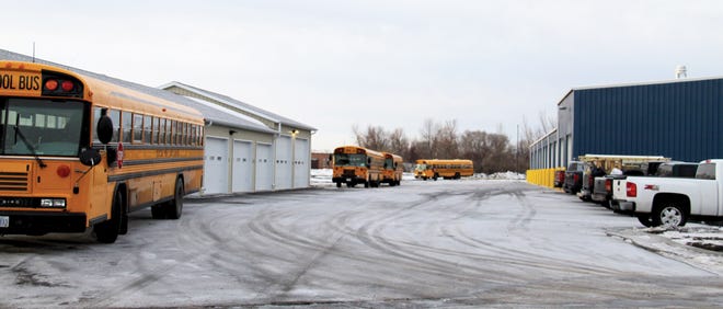 Here, buses pull into the facility after their morning routes on Tuesday.