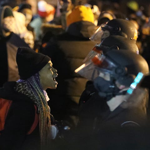 Protester come face-to-face with a line of Rochest
