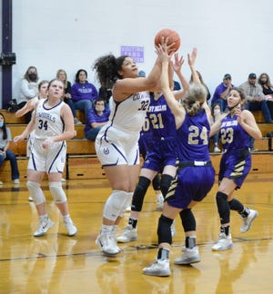 Mason High School's Lauren Olson (32) goes up for a shot against San Saba during a District 29-2A game in Mason during the 2020-2021 season.