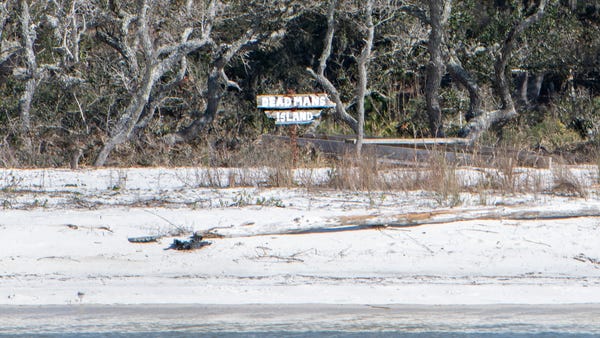 A small sign is displayed marking Deadman's Island
