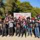 Members of Redrum Motorcycle Club stand with Wendsler Nosie and members of Apache Stronghold at Oak Flat on Feb. 21, 2021.
