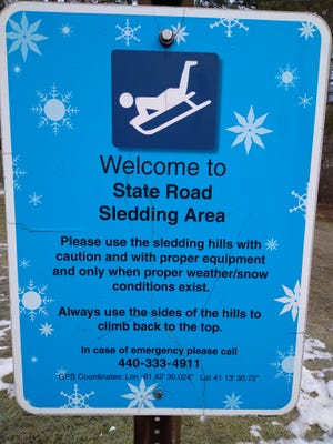 A sign posted at the sledding area at Hinckley Reservation in Medina County.