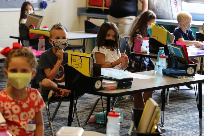 Holland Public Schools will consider lifting its K-12 mask mandate in the near future.