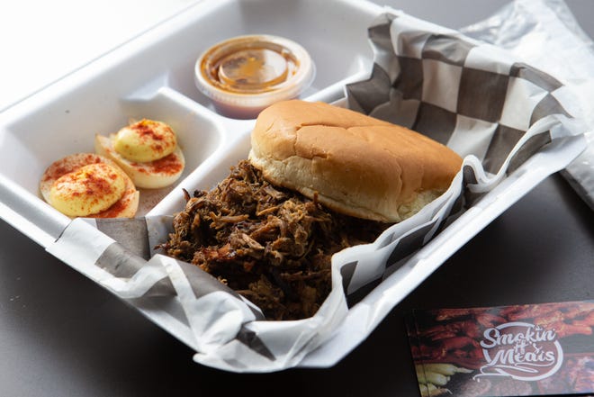 The 785 Special from Smokin' H's Meats features a smoked pulled pork sandwich and side of smoked deviled eggs for $7.85. The barbecue is something special too — honey mango.