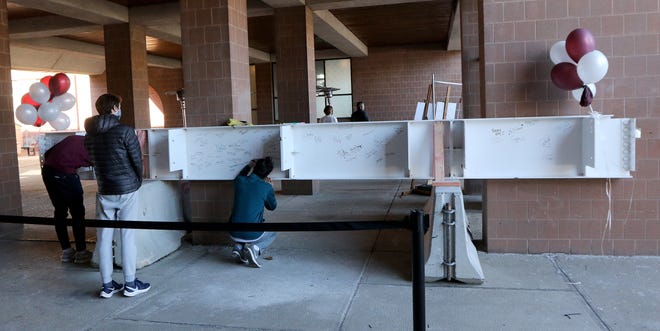 Arlington High School seniors were given the opportunity, Feb. 25 2021, to sign the beam that will be put into the new school during the Topping Off Ceremony in March.
