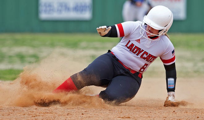 Tristen Hoelscher slides into second for Ballinger during a game against Reagan County in the Concho Classic Softball Tournament on Thursday, Feb. 25, 2021.