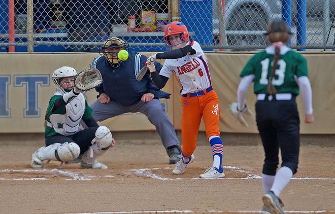 Laynee Crooks, center, takes a swing for Central during a game against Monahans in the Concho Classic Softball Tournament on Thursday, Feb. 25, 2021.