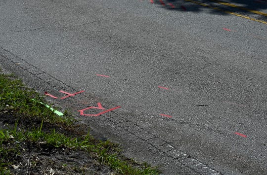 Crash investigation markings can be seen on the 1200 block of South Indian River Drive on Thursday, February 25, 2021 in Fort Pierce.  On February 7, a 32-year-old woman was killed in a car accident on the 1200 block of Indian River Drive.  The scenery of South Indian River Drive has its price.  Trees and power poles are often very close to the sidewalk, trees, bushes and shrubs can block the view of oncoming traffic in curves and most lanes do not have enough hard shoulders for emergencies at the roadside.