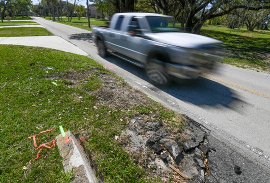 Traffic passes the area around the 1200 block of South Indian River Drive in Fort Pierce on Thursday, February 25, 2021.  On February 7, a 32-year-old woman was killed in a car accident on the 1200 block of Indian River Drive.  The scenery of South Indian River Drive has its price.  Trees and power poles are often very close to the sidewalk, trees, bushes and shrubs can block the view of oncoming traffic in curves and most lanes do not have enough hard shoulders for emergencies at the roadside.