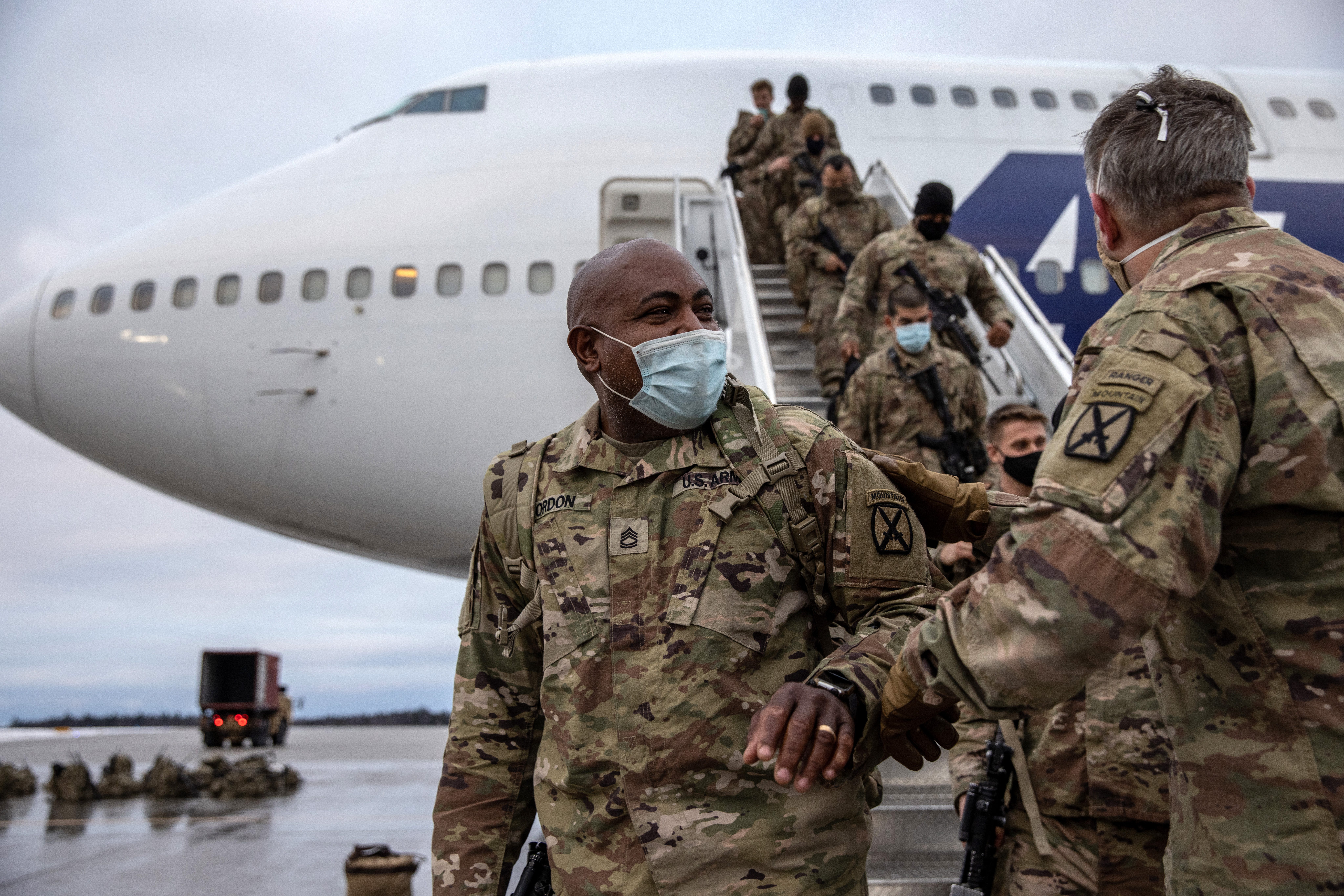 Army soldiers return from Afghanistan on Dec. 10, 2020, at Fort Drum, New York.