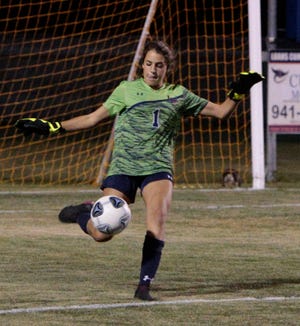 Lemon Bay goalie Isabelle Ragazzone takes a kick against Arnold High in the Class 4A girls soccer state semifinal at Veterans Stadium in Englewood.