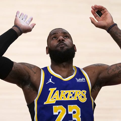 Los Angeles Lakers forward LeBron James gestures  