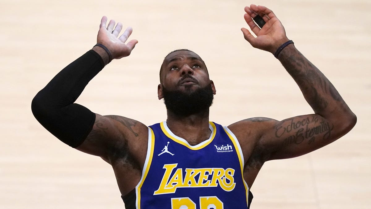 Los Angeles Lakers forward LeBron James gestures  in the first half against the Portland Trail Blazers at Staples Center.