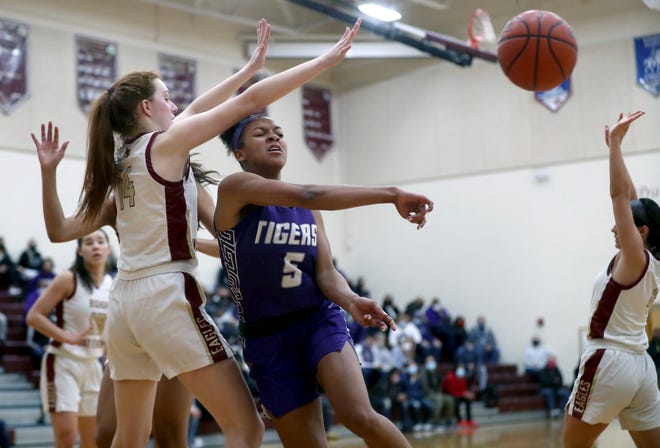 Jocelyn Tate of Pickerington Central fires a pass during the Tigers' Division I district semifinal win at Watterson on Saturday.