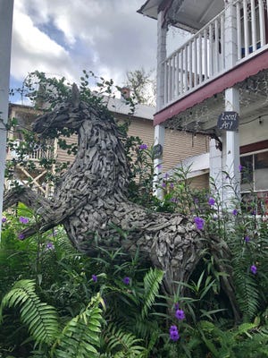 Wood sculpture of a horse on Cuna Street in downtown St. Augustine.