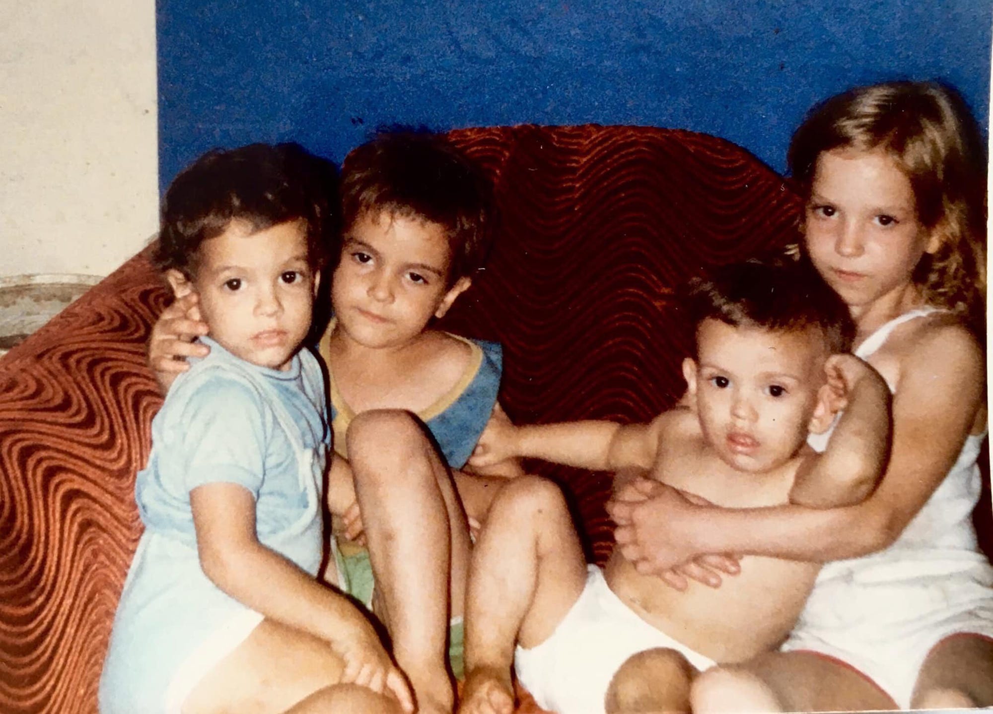 Grace Wild, on the far right, has a bruised arm from her father's abuse.