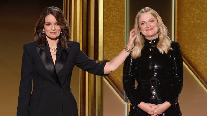 Golden Globe hosts Tina Fey and Amy Poehler during the 78th Annual Golden Globe Awards at The Beverly Hilton Hotel.