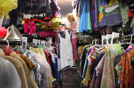 Owner and operator of Costumes by Margie, Cheryl Harmon, within just a small portion of her huge costume inventory at 3818 North Illinois. The costume shop, which had a loyal following, closed during the novel coronavirus pandemic.  IndyStar file photo (Frank Espich/The Star)