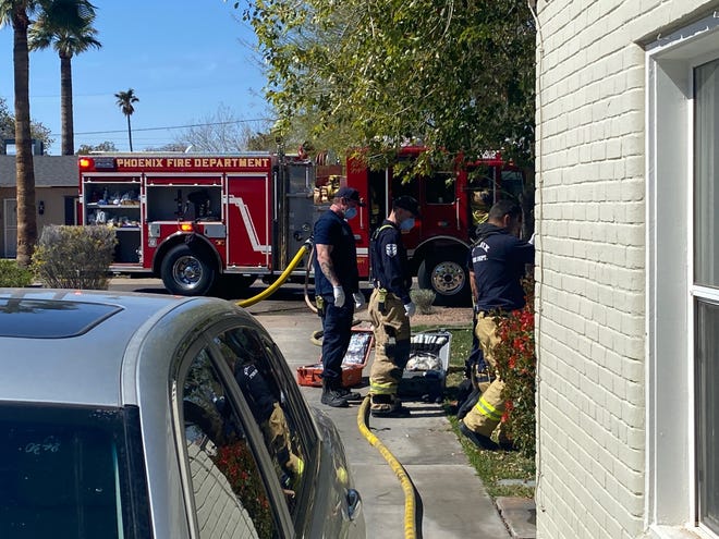 A man was hospitalized in extremely critical condition after he was found near a garage fire in Phoenix on Tuesday, March 2, 2021.