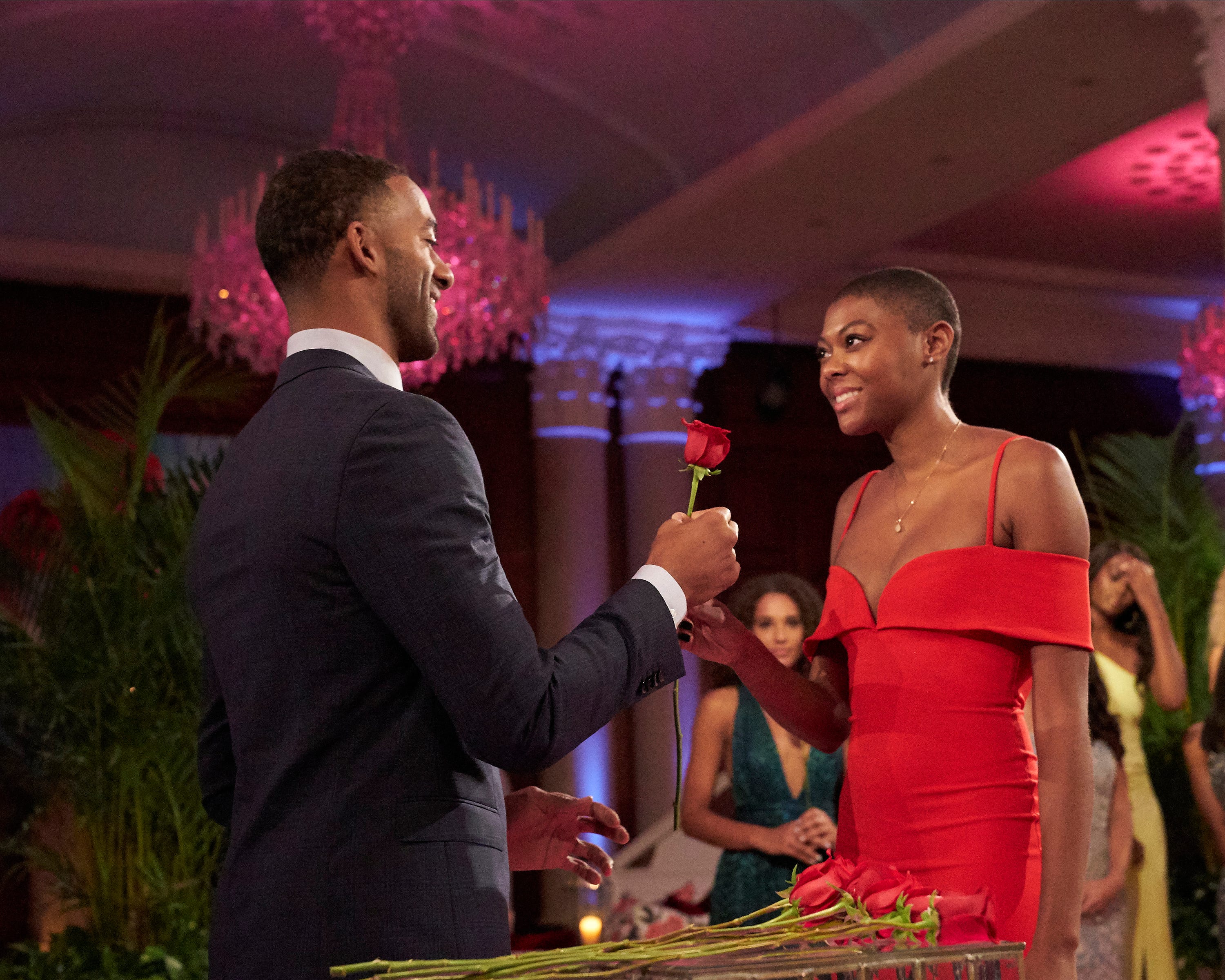 Contestant Chelsea Vaughn accepts a rose from Bachelor Matt James.