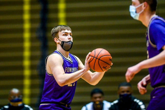 Fowlerville's Brendan Young shoots against Eastern during the first quarter on Tuesday, March 2, 2021, at the Don Johnson Fieldhouse in Lansing.