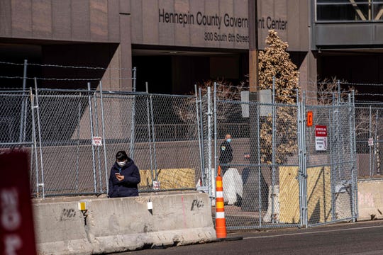 Layers of barbed wire fence and razor wire were built in front of Hennepin County Government Headquarters in Minneapolis. The security measures were being increased before jury selection begins at the trial of former Minneapolis Police officer Derek Chauvin in George Floyd's death. March 3, 2021