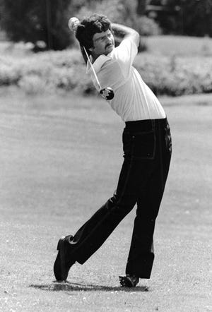 Ken Kellaney, who finished in
the top five at state for three years at Guilford, hits a shot in 1975, the summer after his freshman year at Illinois.