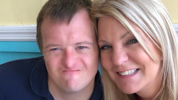 Nick Revels, who has Down syndrome, and his mother