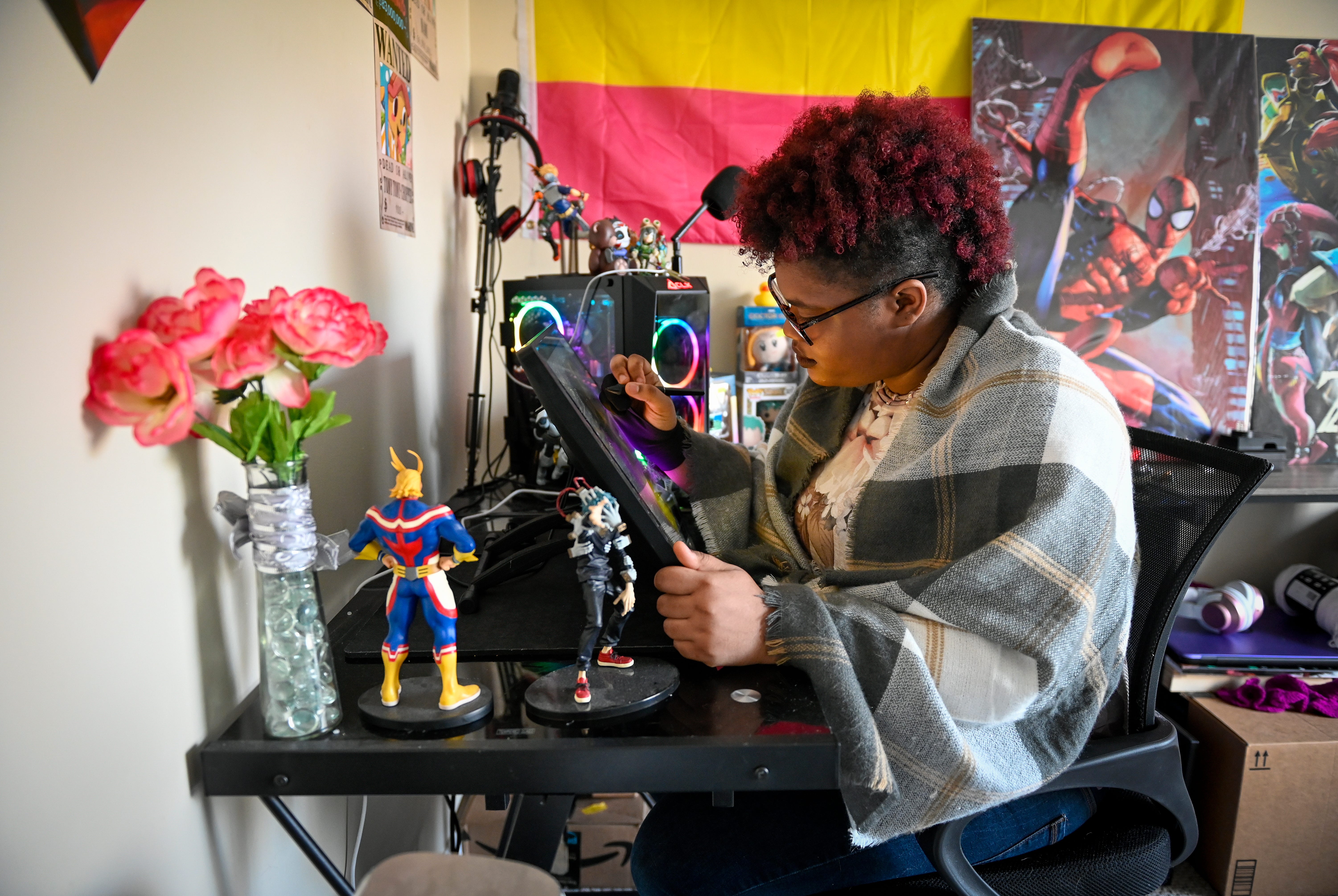 Tianna Carr works on artwork in her Taylor home, Friday, March 5, 2021.