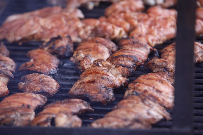 Garlic jerk chicken for sale at the 2021 South Florida Garlic Fest at Wellington Green Park, Saturday, March 6, 2021.
