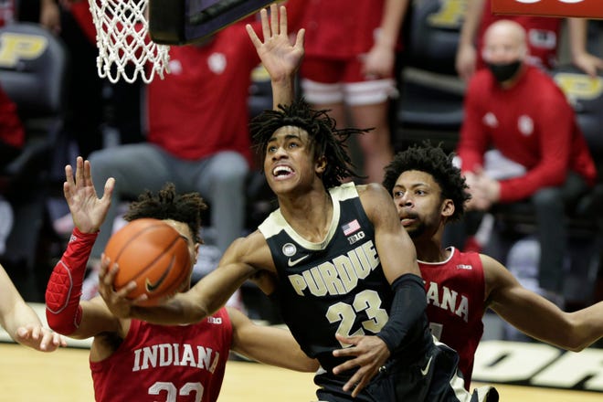 Purdue guard Jaden Ivey (23) goes up for a layup past Indiana forward Jerome Hunter (21) during the first half of an NCAA men's basketball game, Saturday, March 6, 2021 at Mackey Arena in West Lafayette.