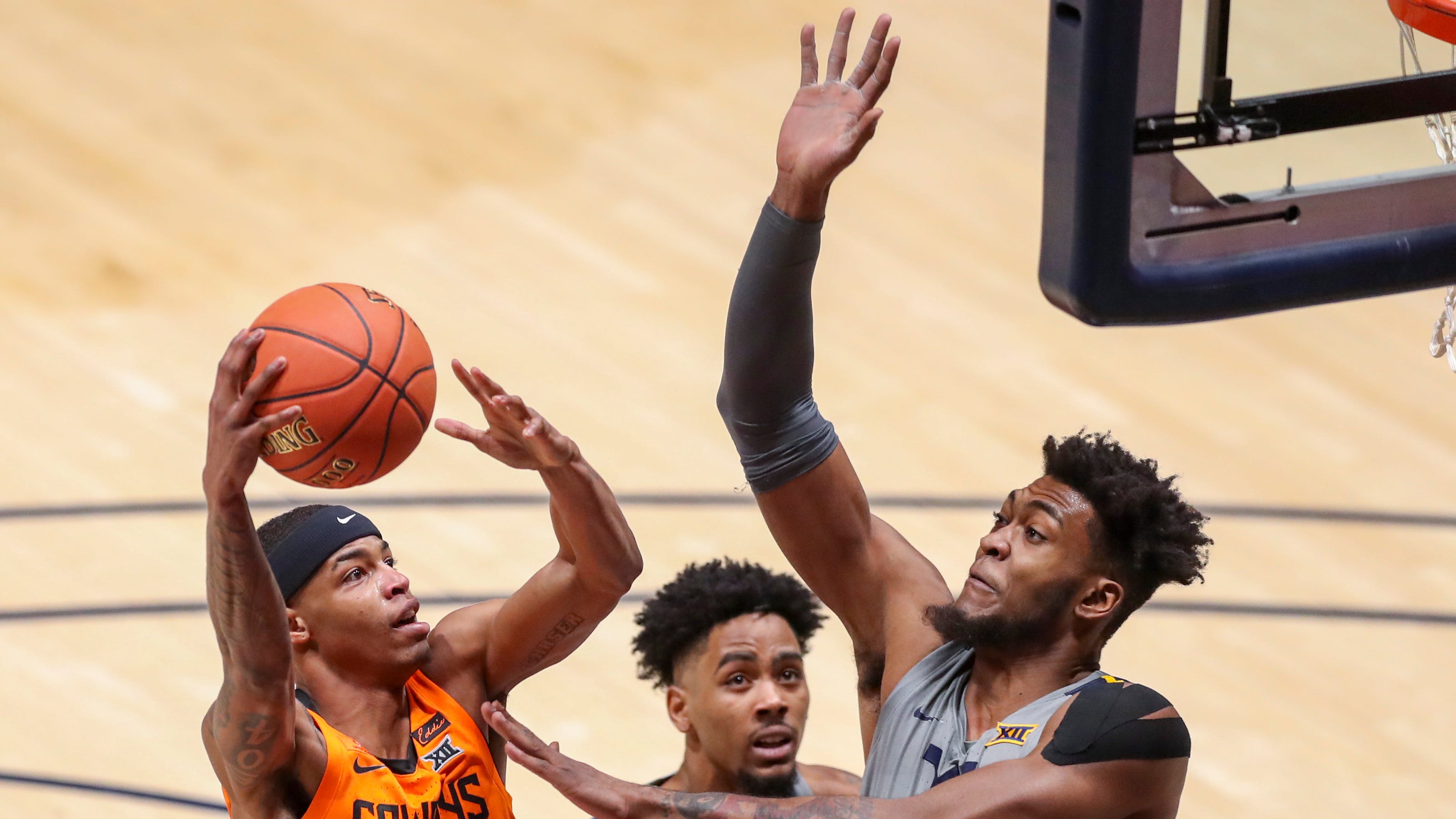 College basketball: Oklahoma State gets upset without Cade ...