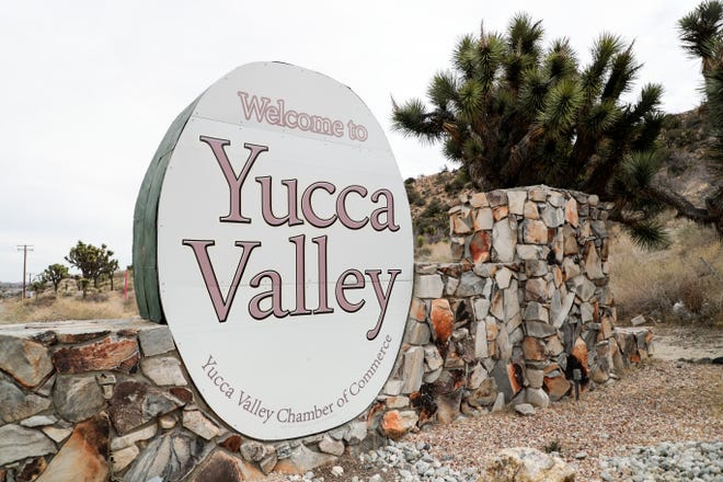 A sign for Yucca Valley, Calif. greets drivers on Highway 62 on Sunday, March 7, 2021.