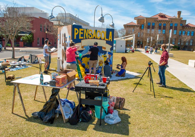 Artists bring their murals to life Sunday, March 7, 2021 during the Cubed Live! mural painting at UWF Historic Trust Museum Plaza.