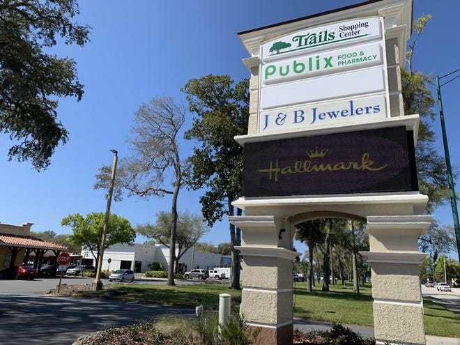 This is the sign for the Trails Shopping Center along Nova Road in Ormond Beach where SoNapa Grille opened its doors on Monday, March 8, 2021. The new restaurant isiin the white building in the background.