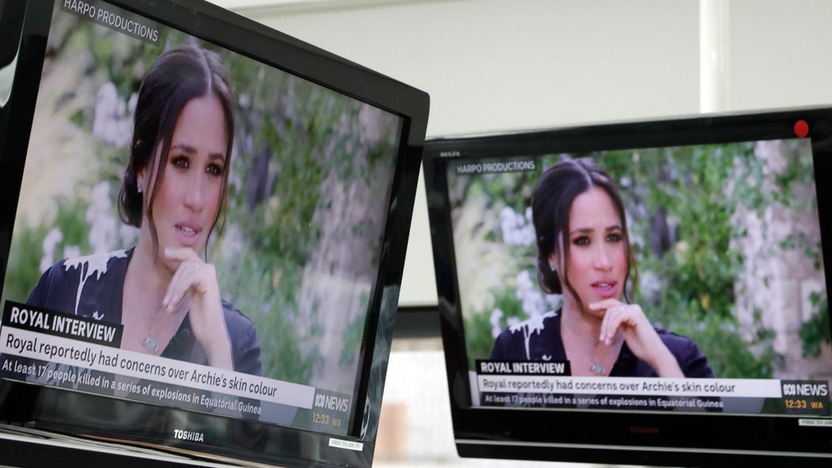 Australian television news in Sydney, Monday, March 8, 2021, reports on an interview of The Duke and Duchess of Sussex by Oprah Winfrey.