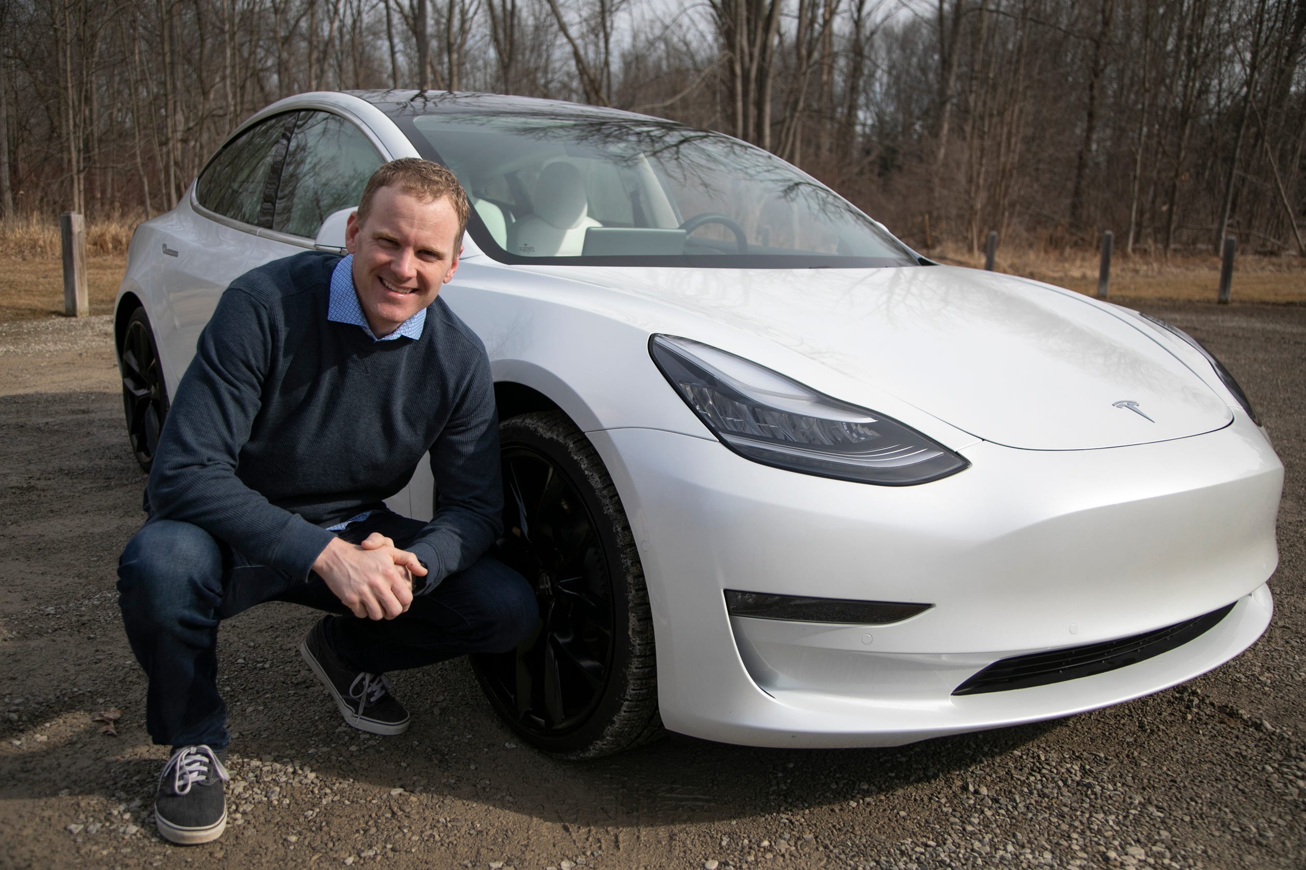 Matt Cooper, 42, of Dewitt is really excited about his 2020 Tesla Model 3. Cooper purchased the car and does wonder about where he will have it serviced but knows he could have it mobile serviced at his home if need be.