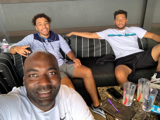 Kenny Beatty with his sons Kayden (left) and Kamby (right).